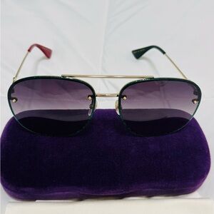 Gucci Gold Frame Sunglasses with Purple Lenses